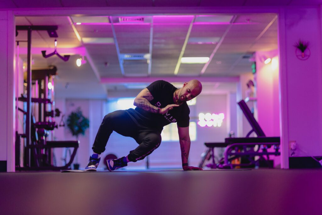 a man doing exercise in a gym