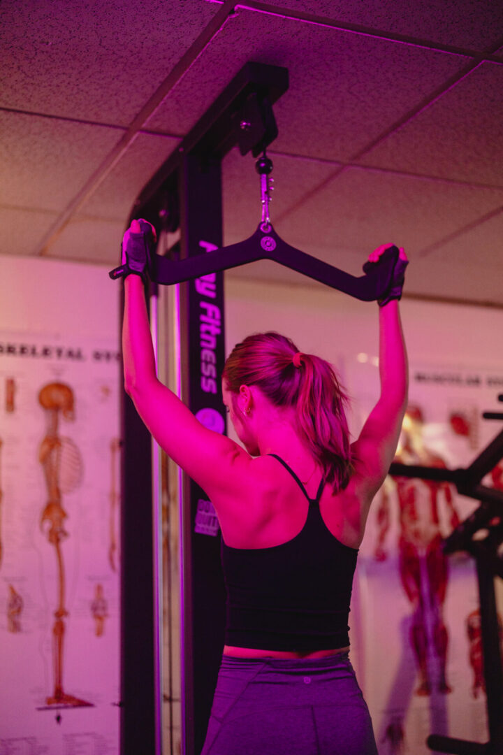 Personal training exercise demonstration at Davis Fitness Method Seattle studio